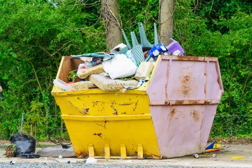 Professional team performing house clearance in Hammersmith