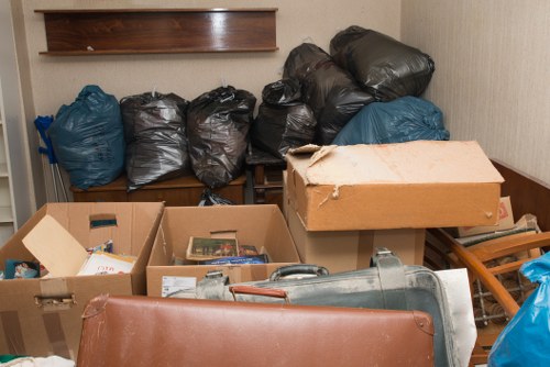 Residents sorting recyclables for waste removal in Hammersmith